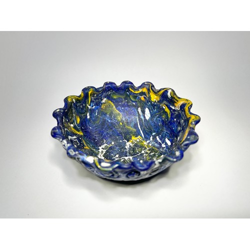 32 - Eastern Mediterranean. Graeco-Roman moulded glass bowl. Circa 1st century BCE–CE 1st century. Cobolt... 