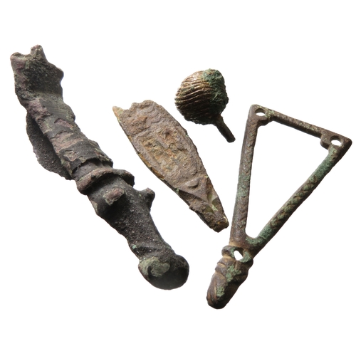 74 - Anglo-Saxon and Medieval artefact group (4). To include a strap end, zoomorphic terminal from a cruc... 