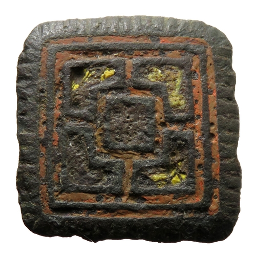 73 - Early Irish geometric enamelled mount. Circa 8th century CE. Formed of a square panel enclosing two ... 