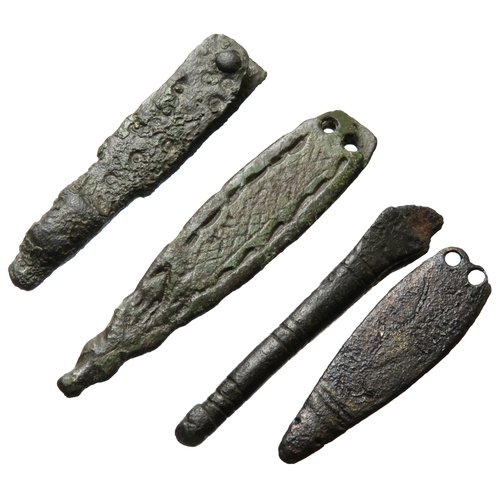 75 - Anglo-Saxon strap end group (4). 9th - 10th century AD. Each with stylised animal head terminals and... 