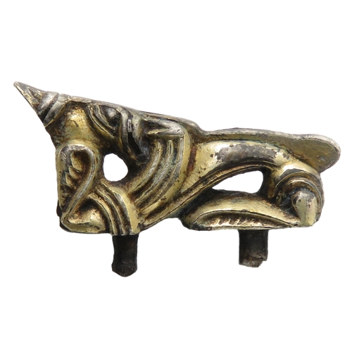 67 - Anglo-Saxon silver-gilt zoomorphic mount. Circa 7th century CE. Style II. In the form of a stylised ... 