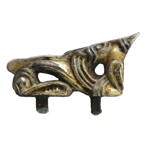 67 - Anglo-Saxon silver-gilt zoomorphic mount. Circa 7th century CE. Style II. In the form of a stylised ... 