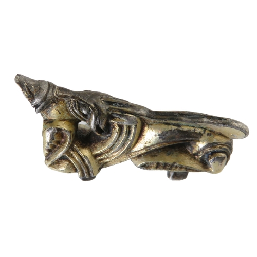 67 - Anglo-Saxon silver-gilt zoomorphic mount. Circa 7th century CE. Style II. In the form of a stylised ... 