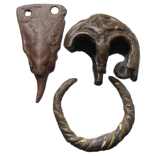 83 - Viking artefacts group (3) to include a scabbard chape, a finger ring and a strap-end, 10th - 11th c... 