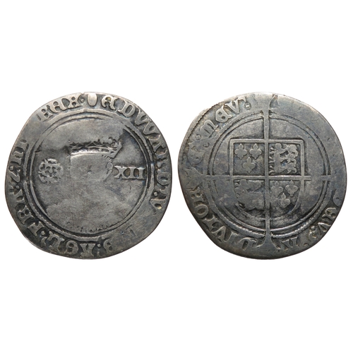 399 - Edward VI shilling. Fine silver issue, 1551-3. Crowned bust facing, rose left, XII right. R. Shield ... 