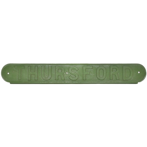 142 - An LNER seat back plate, THURSFORD, from the Melton Constable to Fakenham section of the Midland and... 