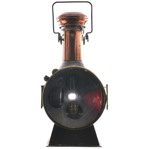 169 - An S.N.C.F. locomotive headlamp, with copper chimney, brass bezel and fittings, by A Butin of Paris.... 