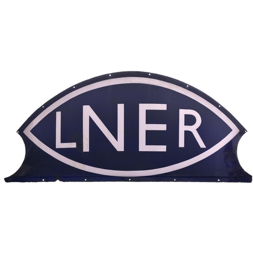 196 - An LNER winking eye fascia sign from Silvertown Station. Enamel, 52