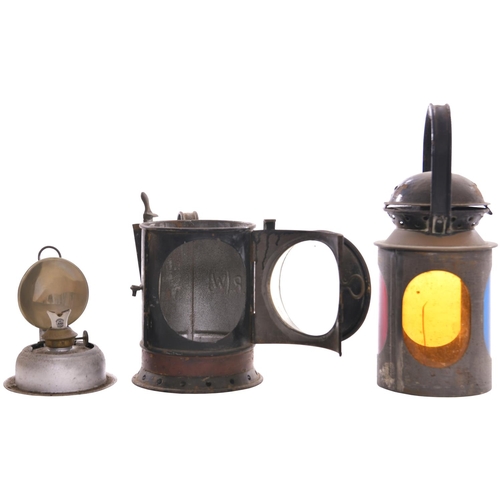 41 - A BR(W), GWR pattern, four aspect brass collared handlamp, the side marked SHREWSBURY, complete and ... 