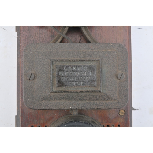 138 - London & North Western Railway bell & plunger mounted on wooden back board. (Postage Band: N/A)