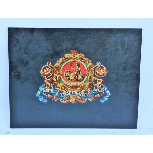 347 - London North Western Railway coat of arms mounted on wood board, 11