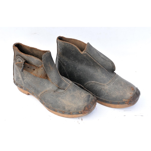 369 - Great Western Railway wooden clogs (left & right foot), leather embossed 