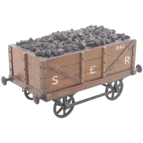 59 - A humidor (tobacco cabinet), in the form of a South Eastern Railway coal wagon. Overall length 13