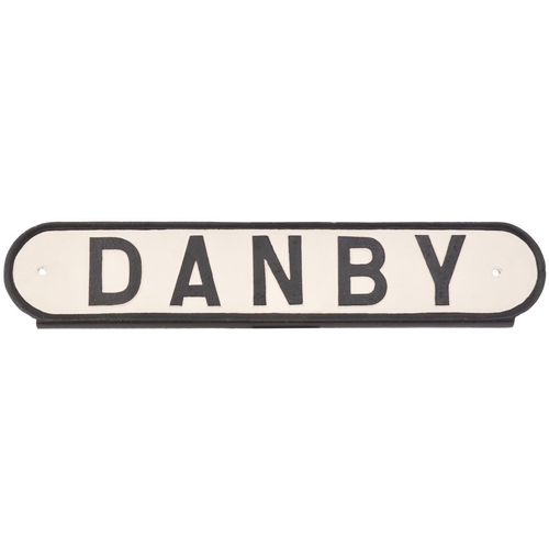 114 - An LNER seat back plate, DANBY, from the North Eastern Railway Esk Valley line. Cast iron, length 22... 