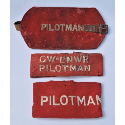 12 - Railway uniform armbands, GW & LNWR Pilotman, Pilotman x2, all complete with leather straps & buckle... 