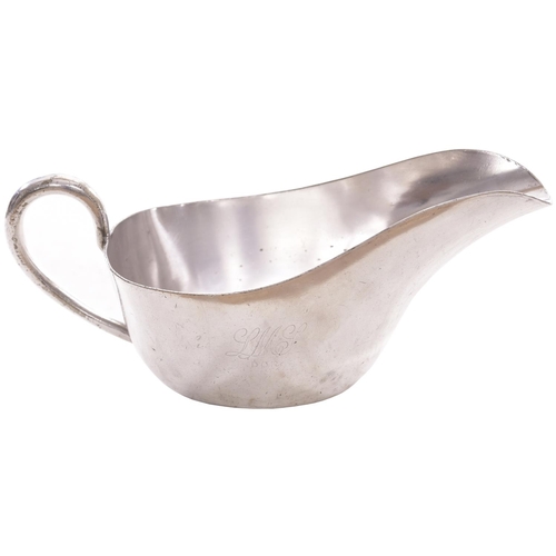 120 - An LMS Dornoch Hotel gravy boat by Mappin and Webb, the side engraved LMS, DOR. Silver plate, length... 