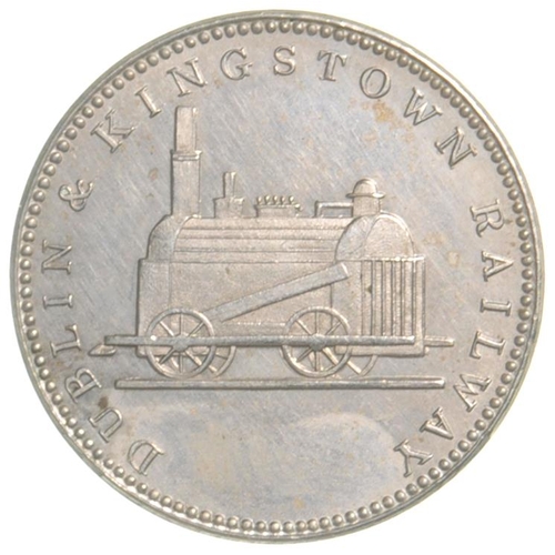 160 - A Dublin and Kingstown Railway second class token depicting an early locomotive. The company opened ... 