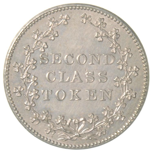 160 - A Dublin and Kingstown Railway second class token depicting an early locomotive. The company opened ... 