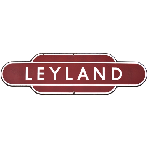 A BR(M) totem sign, LEYLAND, (h/f), a West Coast Main Line station just south of Preston. Excellent colour and shine, a little mottling and edge chips, a few tiny  blemishes, some marks on the white enamel. (Postage Band: D)