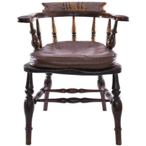 150 - A Midland Railway captains chair, with decorative company initials prominently engraved in the top o... 