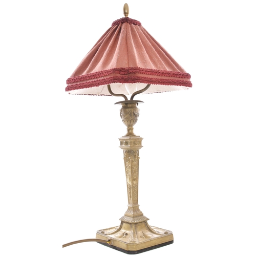 161 - A Pullman Car table lamp, cast brass with maroon cloth shade, overall height 19