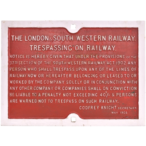 183 - An LSWR trespass notice, the full text type signed by Godfrey Knight, Secretary, May 1903. Cast iron... 