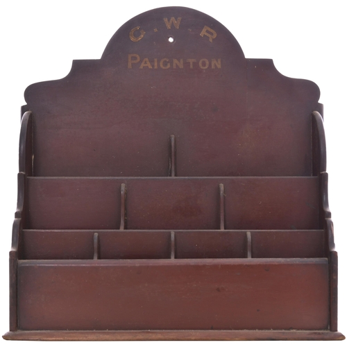 210 - A GWR leaflet rack, wooden with nine compartments, GWR PAIGNTON in gilt lettering on the top front, ... 