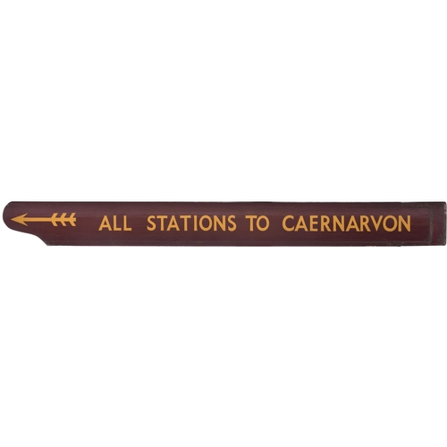 125 - A fingerboard, ALL STATIONS TO CAERNARVON. Painted wood, 60