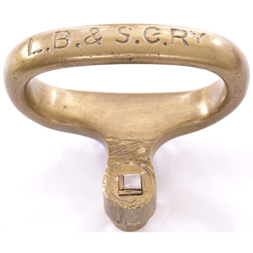 35 - LB&SCR brass coach handle, oval, initials on the front. (Postage Band: A)