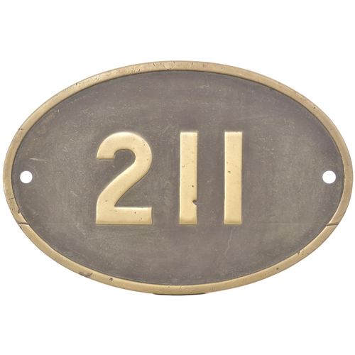 12 - A Rhodesia Railways cabside numberplate, 211, from a 3ft 6ins gauge 12th Class 4-8-2 built by the No... 