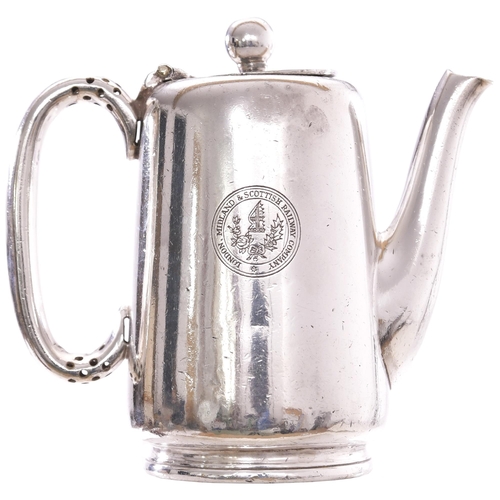 128 - An LMS hot water pot by Walker and Hall, full company name and coat of arms on the side, silver plat... 