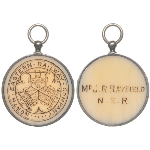 141 - A North Eastern Railway pass, showing the company coat of arms, MR J R RAYFIELD NER, 1¼