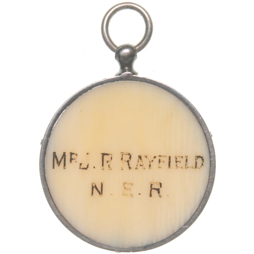 141 - A North Eastern Railway pass, showing the company coat of arms, MR J R RAYFIELD NER, 1¼