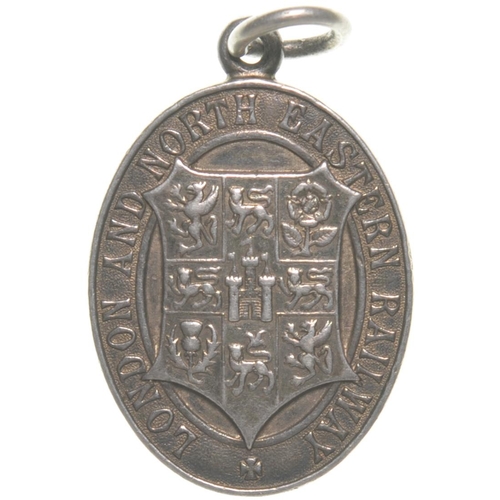 154 - An LNER directors free pass, with coat of arms and stylised initials, H Harper. Silver, 1