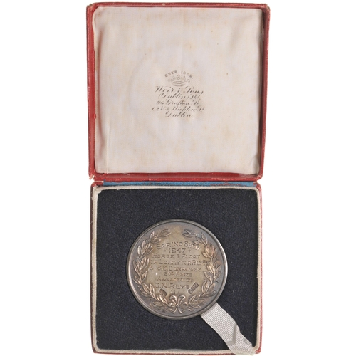 323 - A medallion awarded to the GNR(I), ROYAL DUBLIN SOCIETY SPRING SHOW 1947, HOUSE AND FLOAT OR 'LORRY'... 