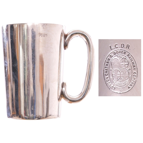 370 - A London, Chatham and Dover Railway pint tankard, the company name and coat of arms on the side, sil... 