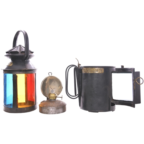 377 - An LSWR square fronted four aspect handlamp, with brass plate showing the company initials, also pla... 