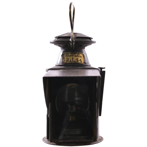 51 - A South Eastern Railway square-fronted three aspect handlamp, the side stamped with the company init... 