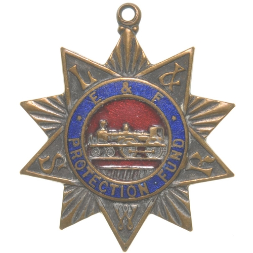 69 - An LSWR medallion, ENGINEMEN AND FIREMEN'S PROTECTION FUND, ESTABLISHED FEBY 1882, brass/enamel, 1¼