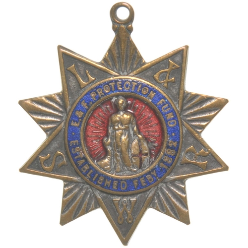 69 - An LSWR medallion, ENGINEMEN AND FIREMEN'S PROTECTION FUND, ESTABLISHED FEBY 1882, brass/enamel, 1¼