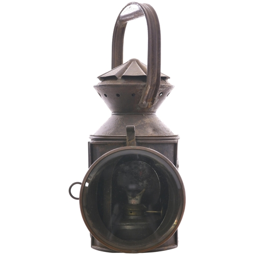 7 - A North British Railway Bullpitts Patent three aspect handlamp, the body stamped LUNAN BAY, a statio... 