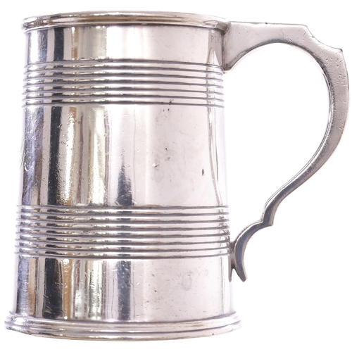 80 - A London and South Western Railway pint tankard by Sanders of London. Silver plate, graduated body w... 