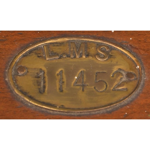 135 - An LMS Art Deco wall clock with square wooden body and chromed hands and face with company initials.... 