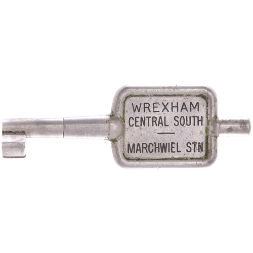 394 - A single line key token, WREXHAM CENTRAL SOUTH-MARCHWIEL STN, (alloy), from the Wrexham to Ellesmere... 