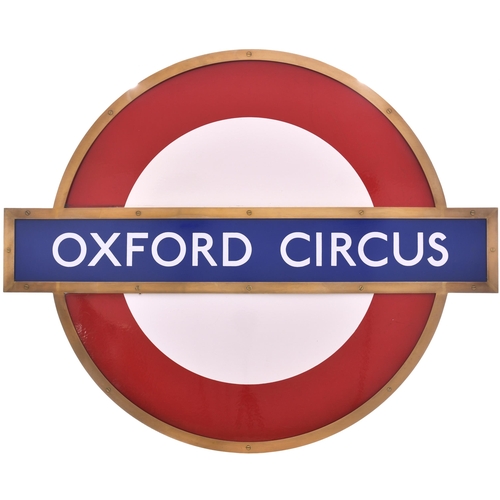 404 - A London Transport target sign, OXFORD CIRCUS. Enamel, with brass frame, 44