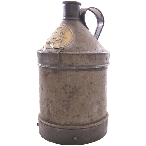 An LB&SCR oil can with a large embossed brass plate, HAND LAMP OIL, EASTBOURNE GOODS, (4"x3") and a steel plate, STORES, 7" diameter, height 12½", original condition with bung. (Postage Band: N/A)