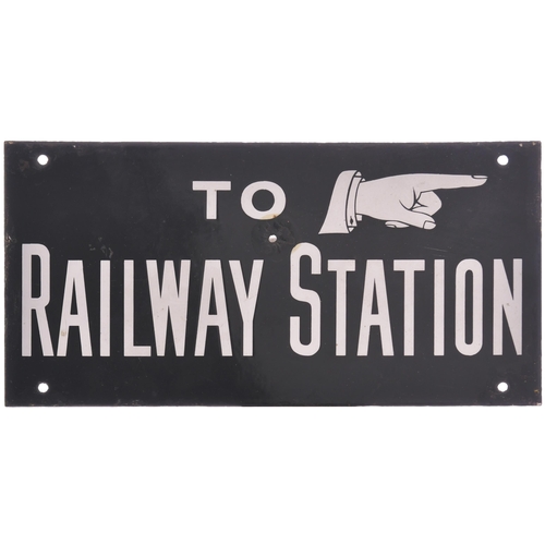 94 - A direction sign, TO RAILWAY STATION, double-sided with pointing hand, enamel, 14