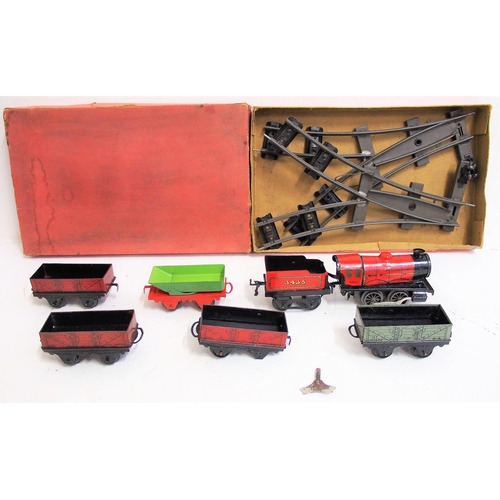 227 - Hornby 'O' Gauge tinplate - selection of track & rolling stock & one locomotive, level crossing (2) ... 