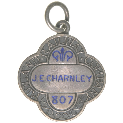 273 - A Midland Railway directors pass, silver, displaying the coat of arms and Wyvern, JE CHARNLEY, 307. ... 