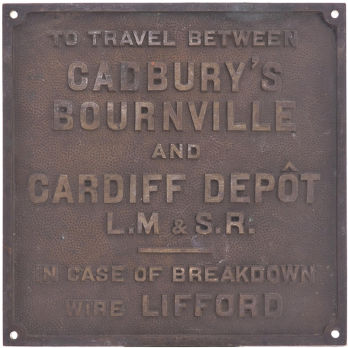 277 - A double-sided cast brass plate ex Cadbury's Bournville, one side states Cardiff Depot LM&SR, other ... 